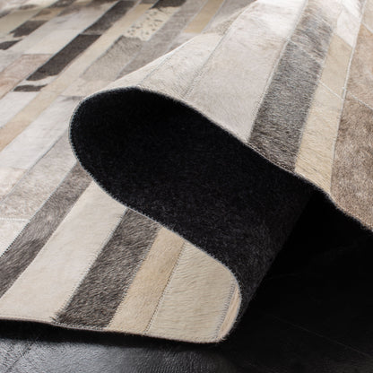 SAFAVIEH Handmade Studio Leather Tennille Modern Leather Rug