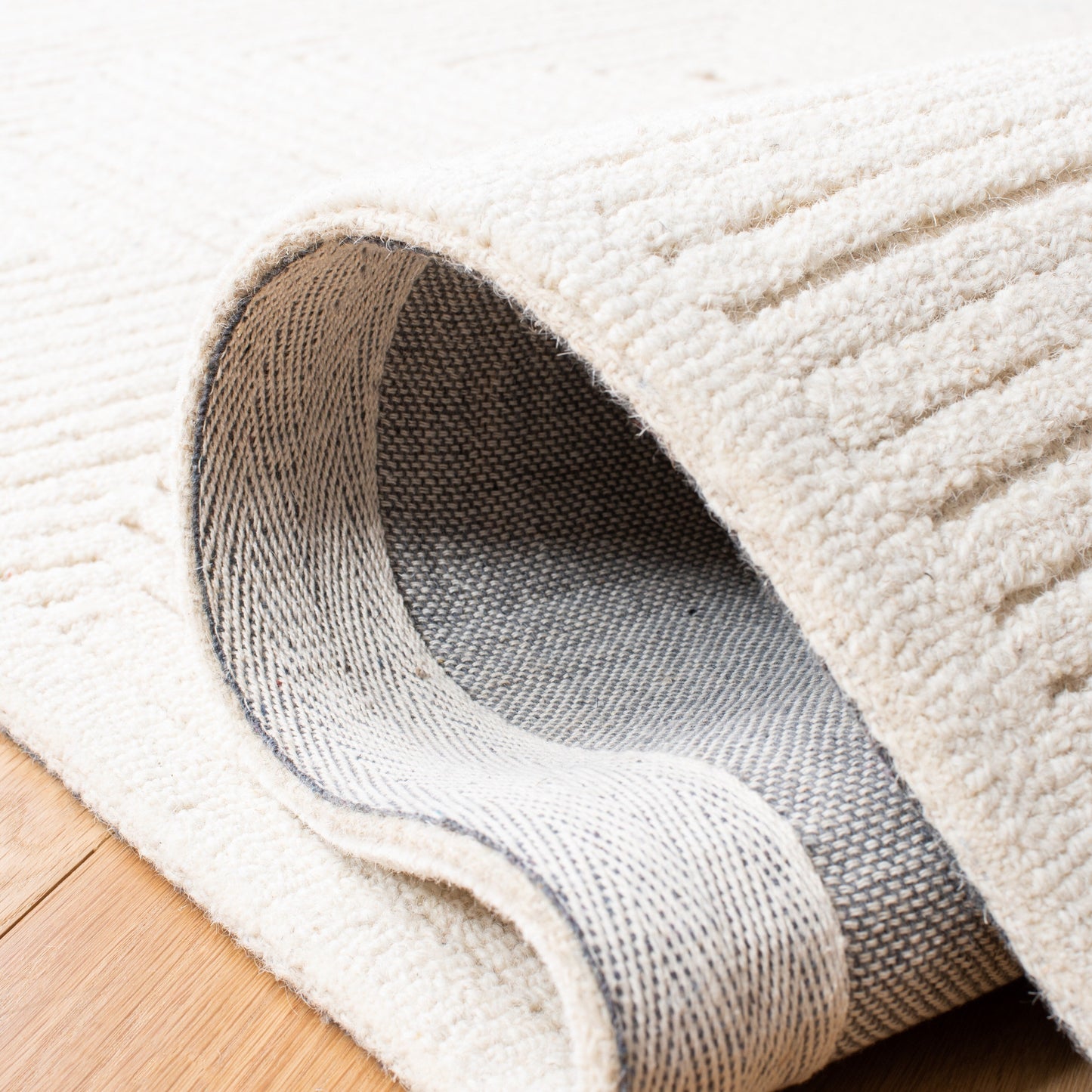 SAFAVIEH Handmade Textural Nigina Wool Rug